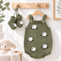 Sage green hand-knitted newborn sheep romper with button straps and knit sheep patches