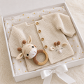 Newborn cardigan and giraffe teether rattle set in gift box with ribbon