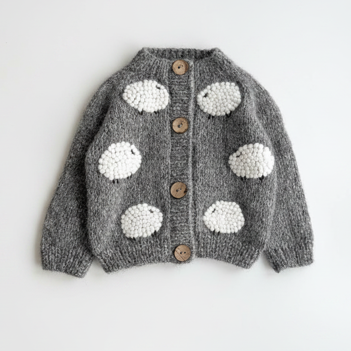 Gray hand-knit baby cardigan with pom-pom spots and wood-button front