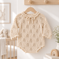 Cream handmade crochet newborn girl romper with long sleeves and bow neck tie