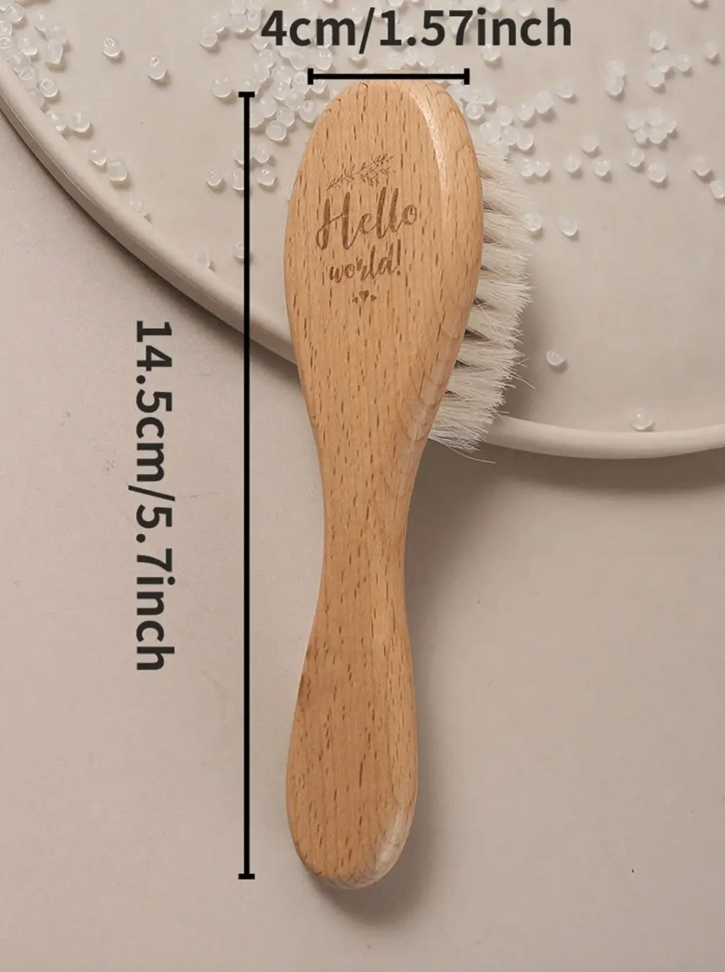 Beechwood baby hair brush with soft white bristles and oval wooden head