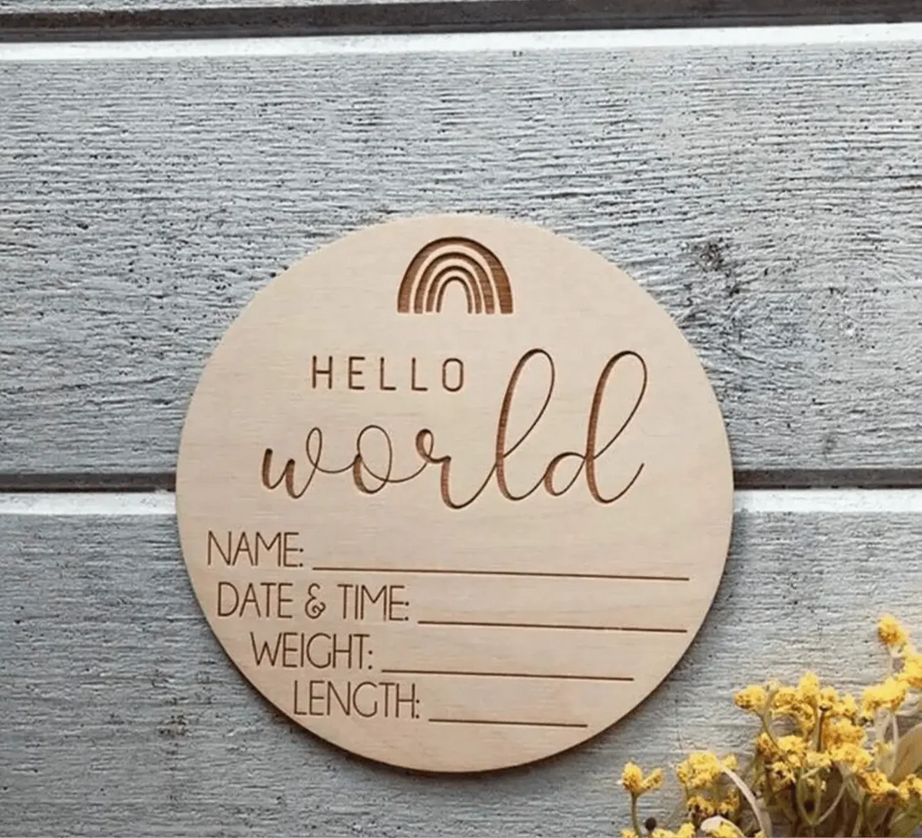 Round wooden baby photo card engraved 'Hello World' with rainbow and blank fields