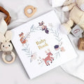 Luxury baby memory book with white cover and gold foiled “Baby Book” title