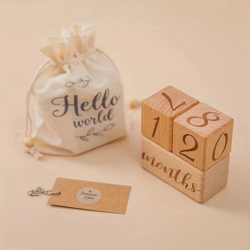 Wooden milestone blocks set with numbers 1 and 2 and 'months' script