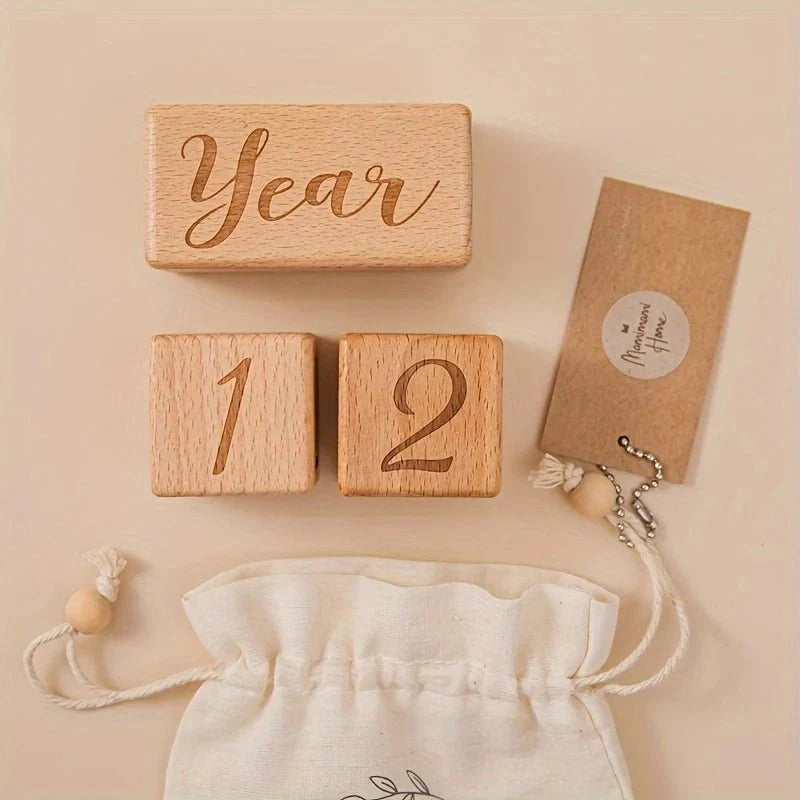 Wooden milestone blocks with 'Year' plaque and number cubes 1 and 2